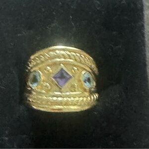 Elegant Gold and Purple Gemstone Ring